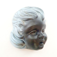 Keramiek kinder hoofdje